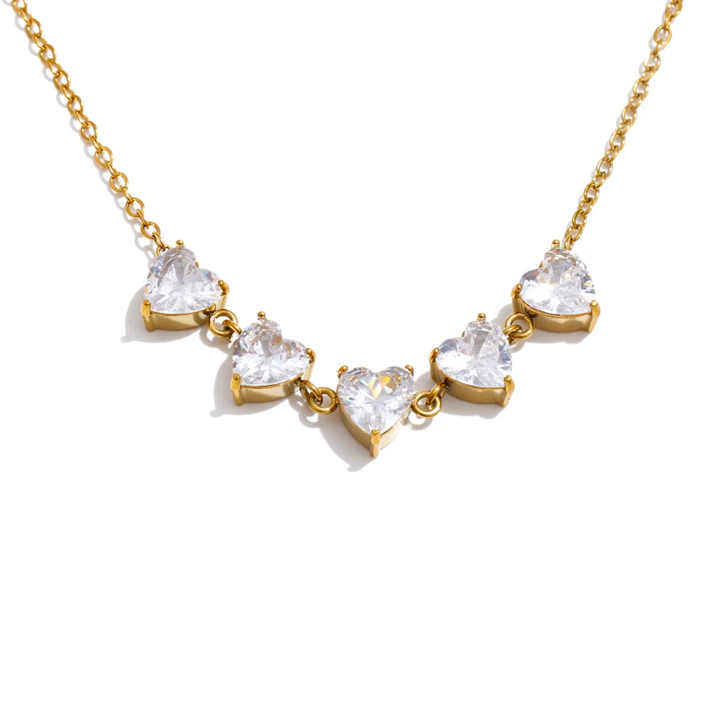 Cubic zirconia heart necklace in gold-plated stainless steel with cubic zirconia.