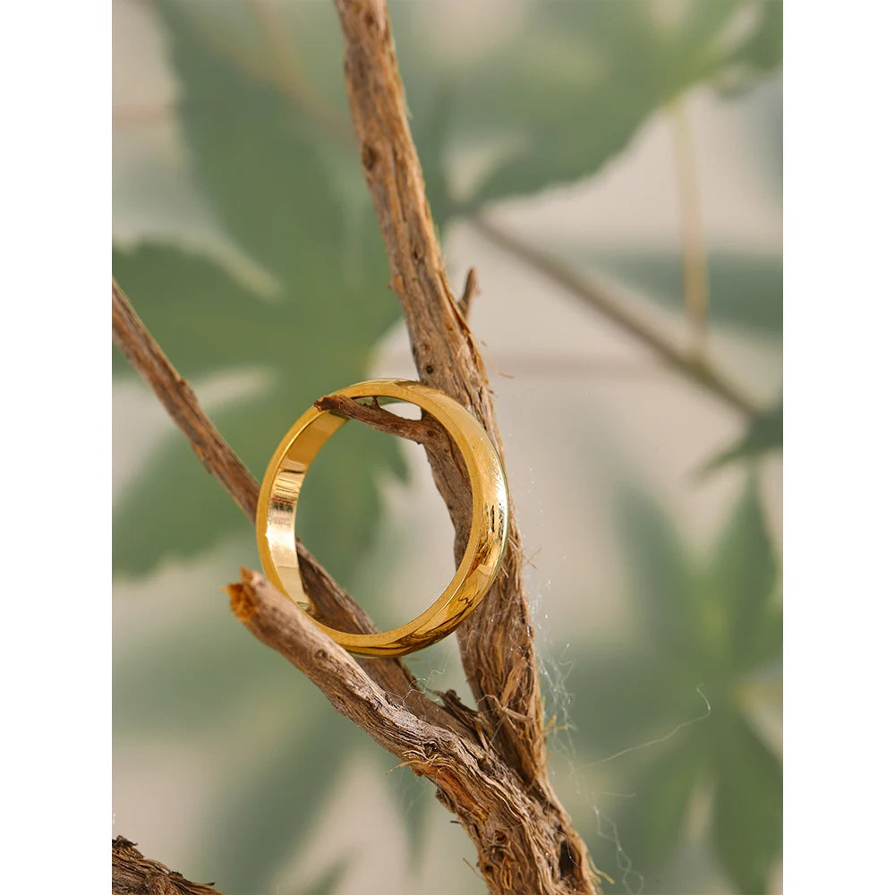 Geometric ring in 18K gold-plated stainless steel.