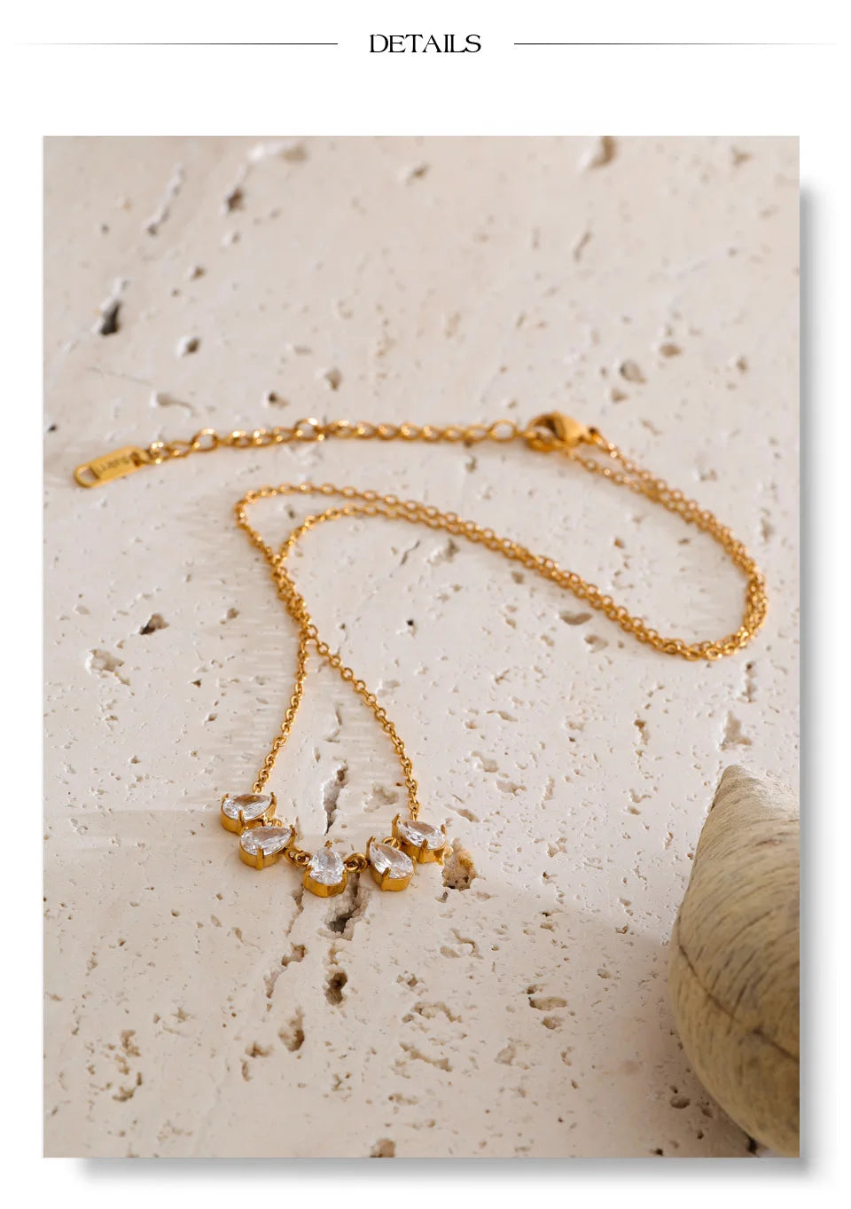 Cubic zirconia geometric necklace in gold-plated stainless steel with cubic zirconia.