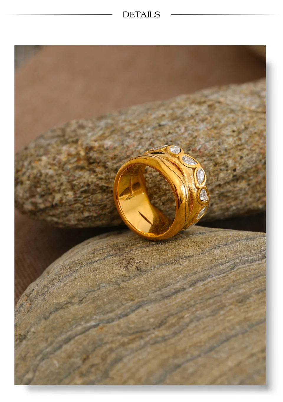 Cubic zirconia geometric ring in 18K gold-plated stainless steel with cubic zirconia.