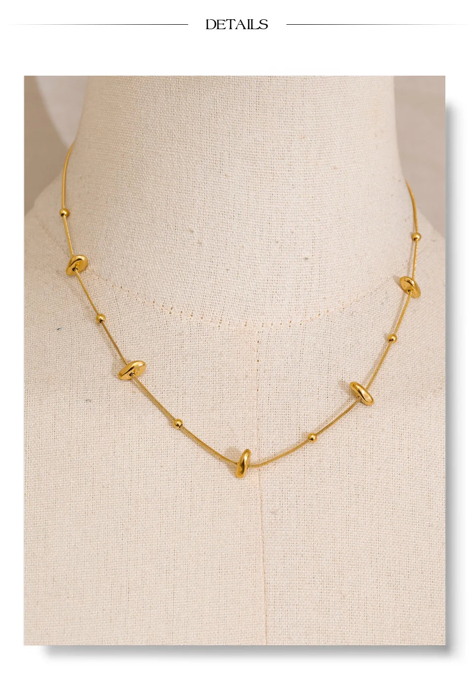 Geometric chain necklace in gold-plated stainless steel.