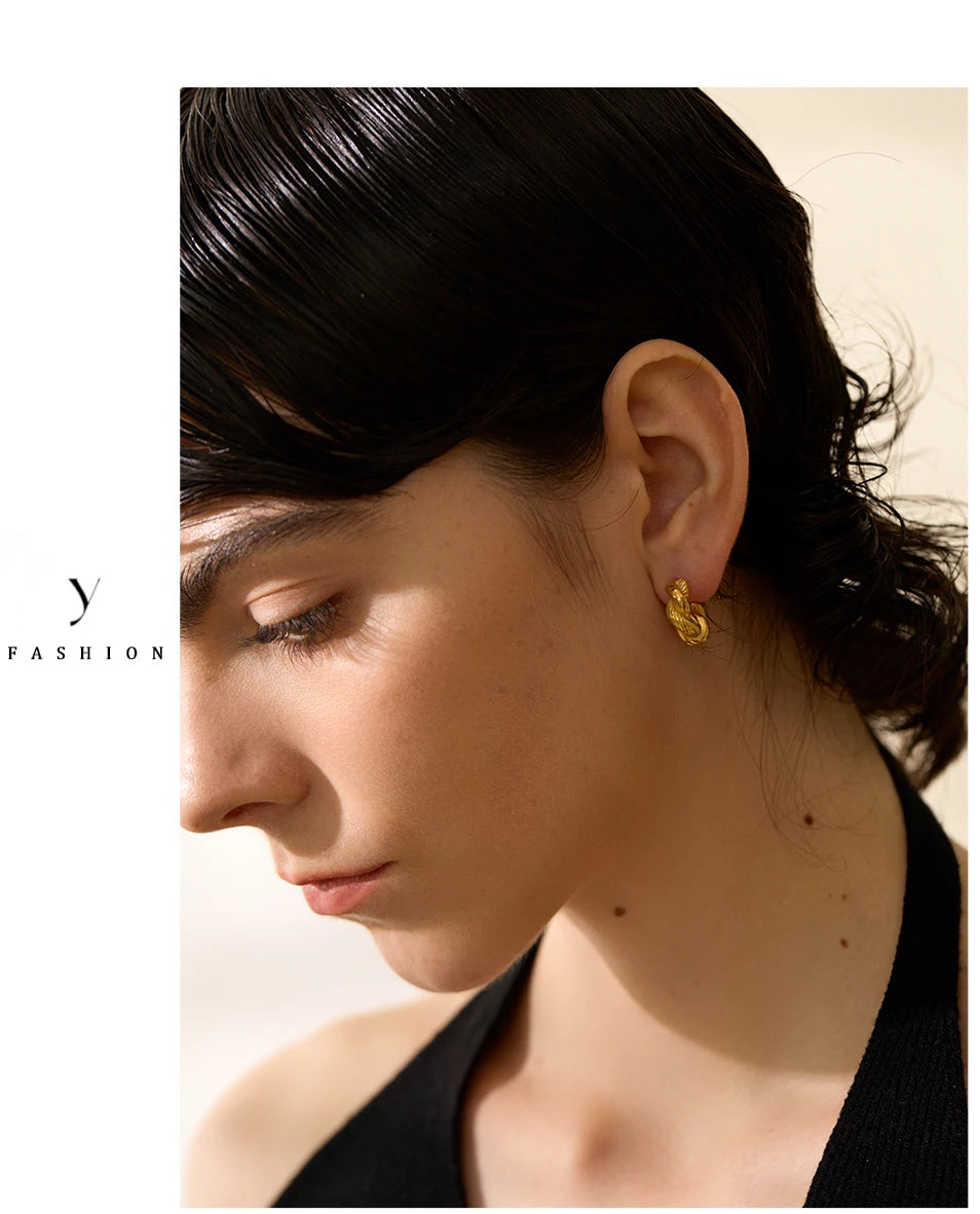 Geometric earrings in gold-plated 316L stainless steel.