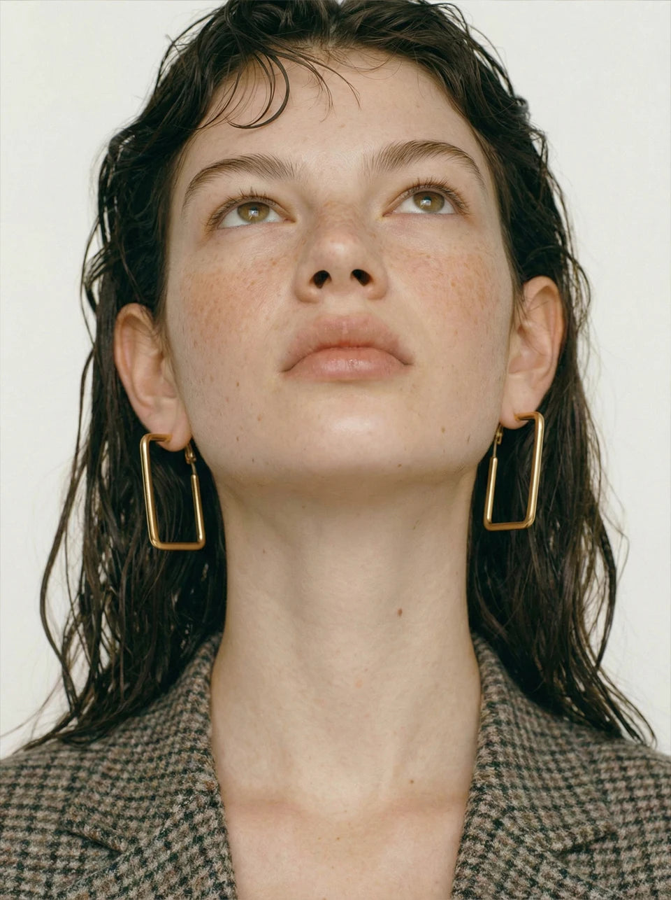 Geometric earrings in gold-plated stainless steel.