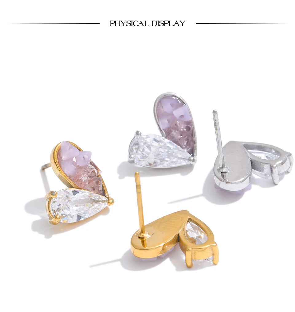 Cubic zirconia resin heart earrings in gold-plated stainless steel with cubic zirconia and resin.
