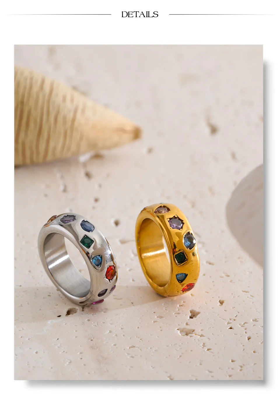 Cubic zirconia multi-color geometric ring in 18K gold-plated stainless steel with cubic zirconia.