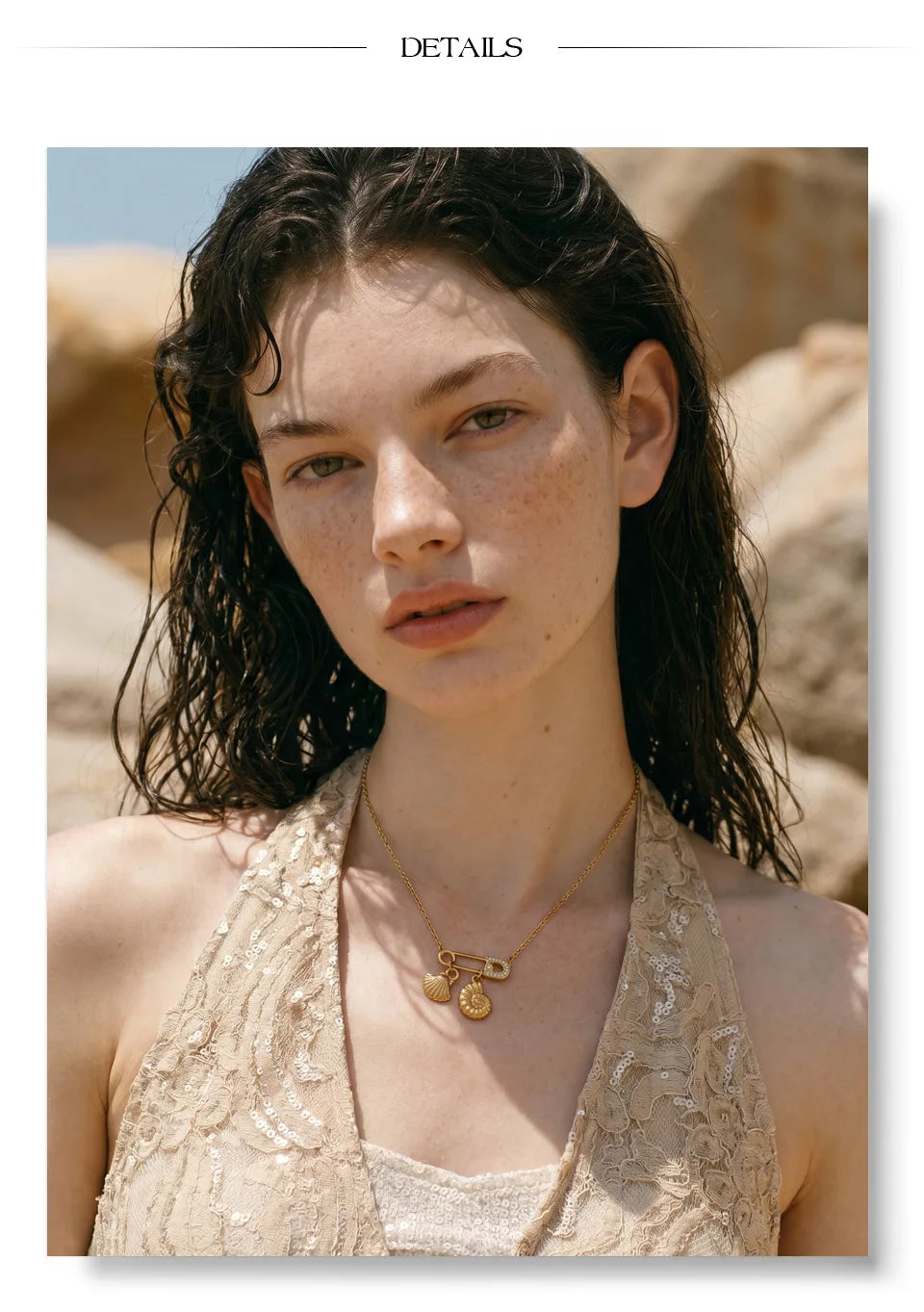 Cubic zirconia shell geometric necklace in gold-plated stainless steel with cubic zirconia and shell.