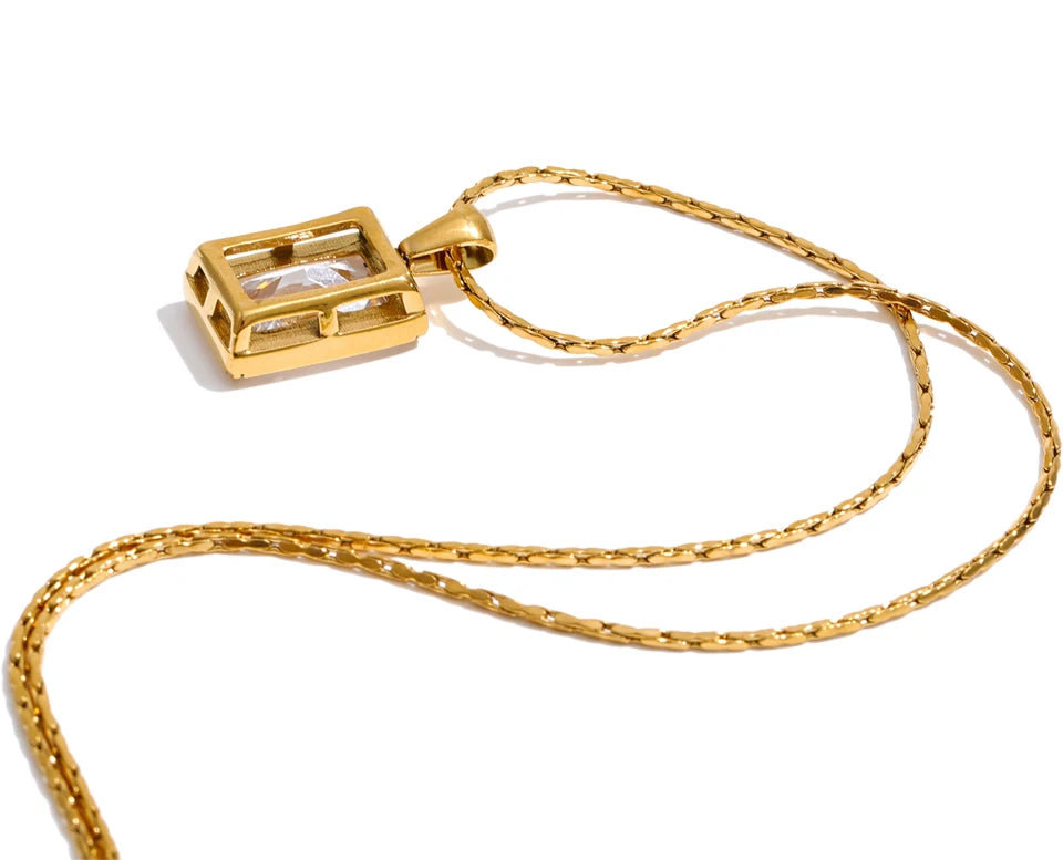 Cubic zirconia geometric necklace in gold-plated stainless steel with cubic zirconia.