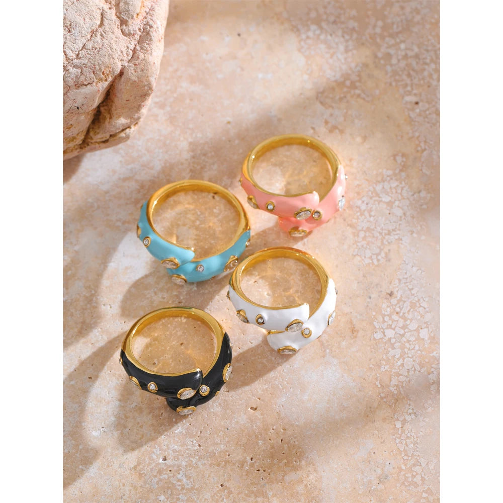 Black cubic zirconia enamel ring in 18K gold-plated stainless steel with cubic zirconia and enamel.