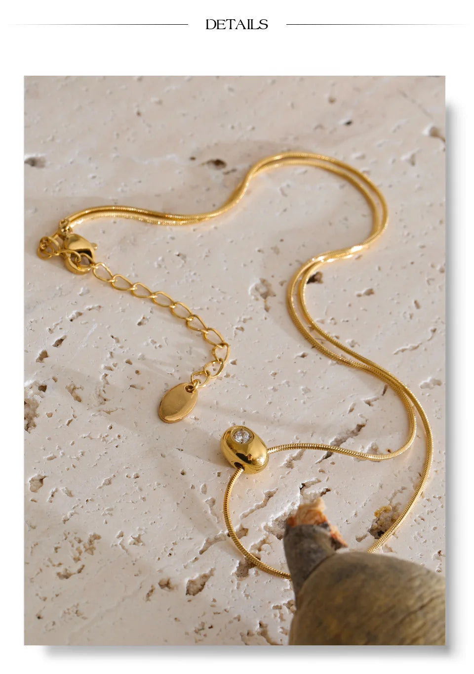 Cubic zirconia geometric necklace in gold-plated stainless steel with cubic zirconia.