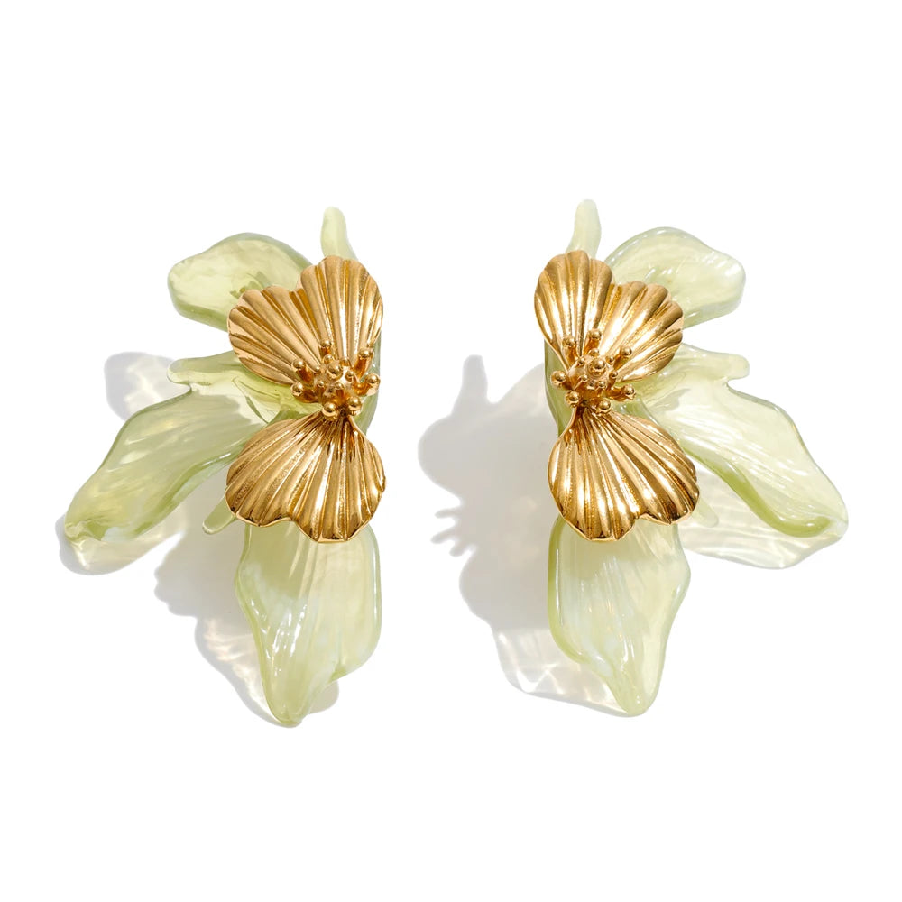 Resin acrylic earrings in gold-plated stainless steel with resin and acrylic.