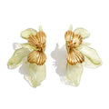 Resin acrylic earrings in gold-plated stainless steel with resin and acrylic.