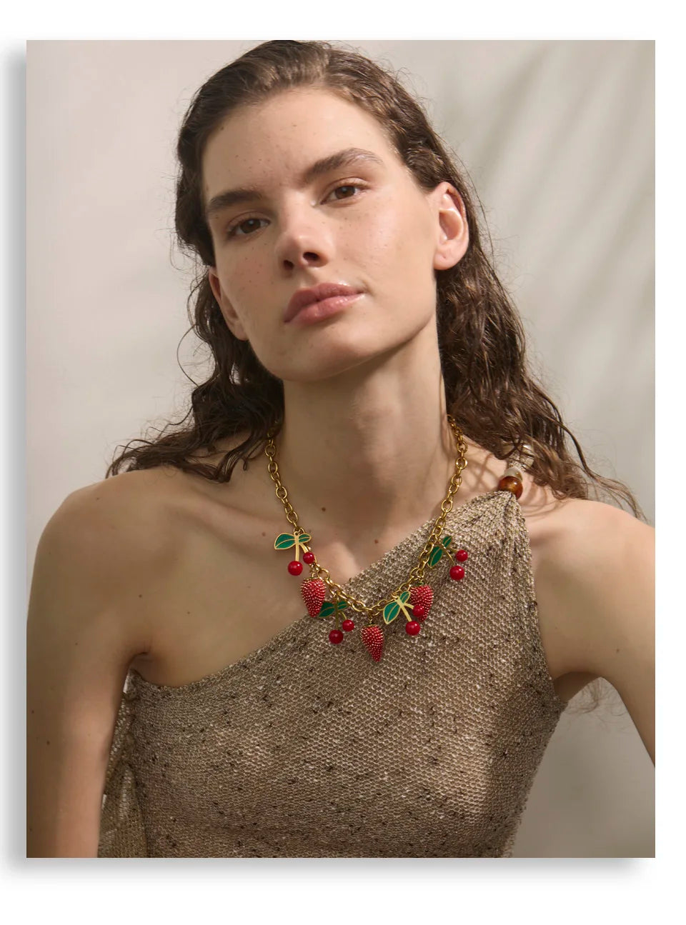 Red acrylic enamel necklace in gold-plated stainless steel with acrylic and enamel.