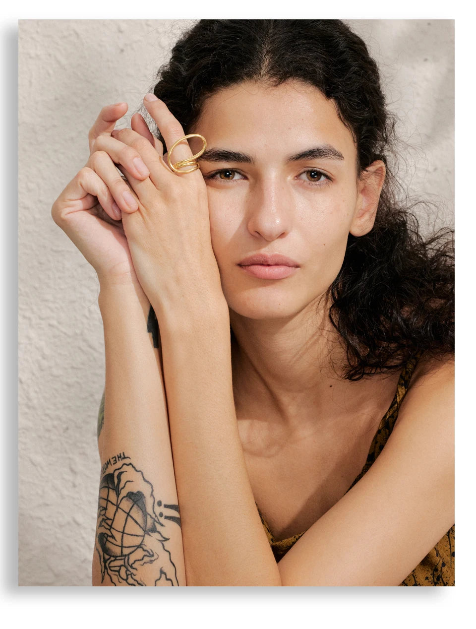Geometric ring in 18K gold-plated stainless steel.