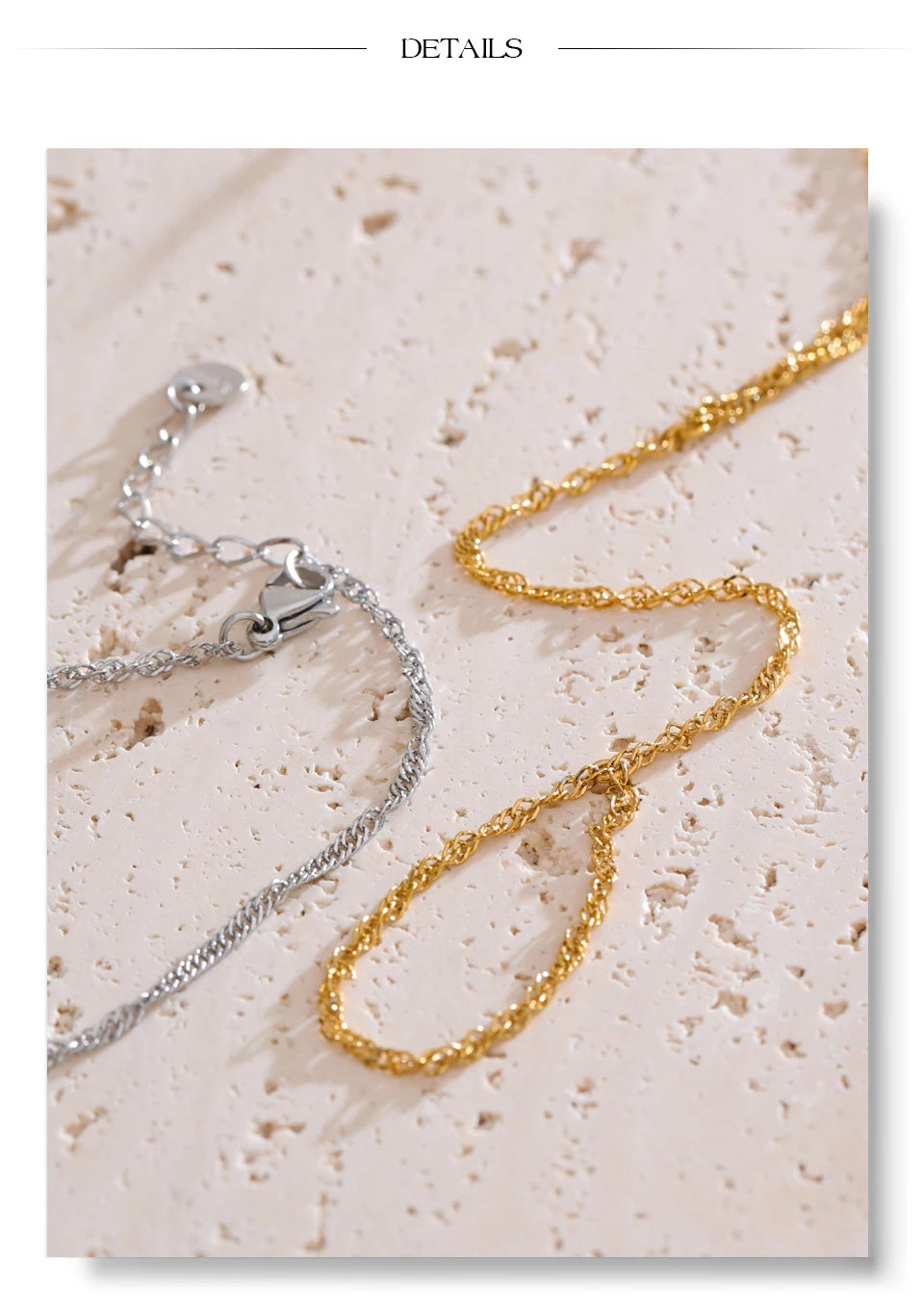 Minimalist geometric chain necklace in gold-plated stainless steel.