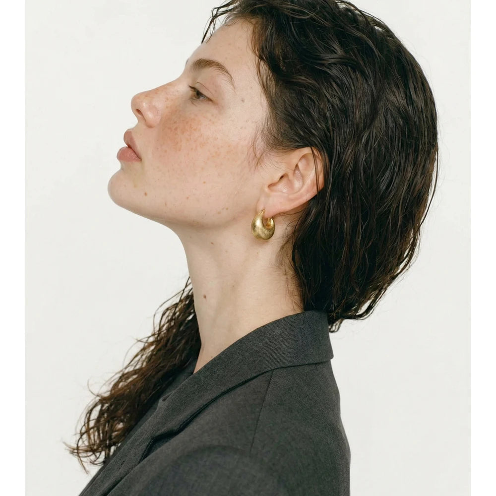 Geometric earrings in gold-plated stainless steel.