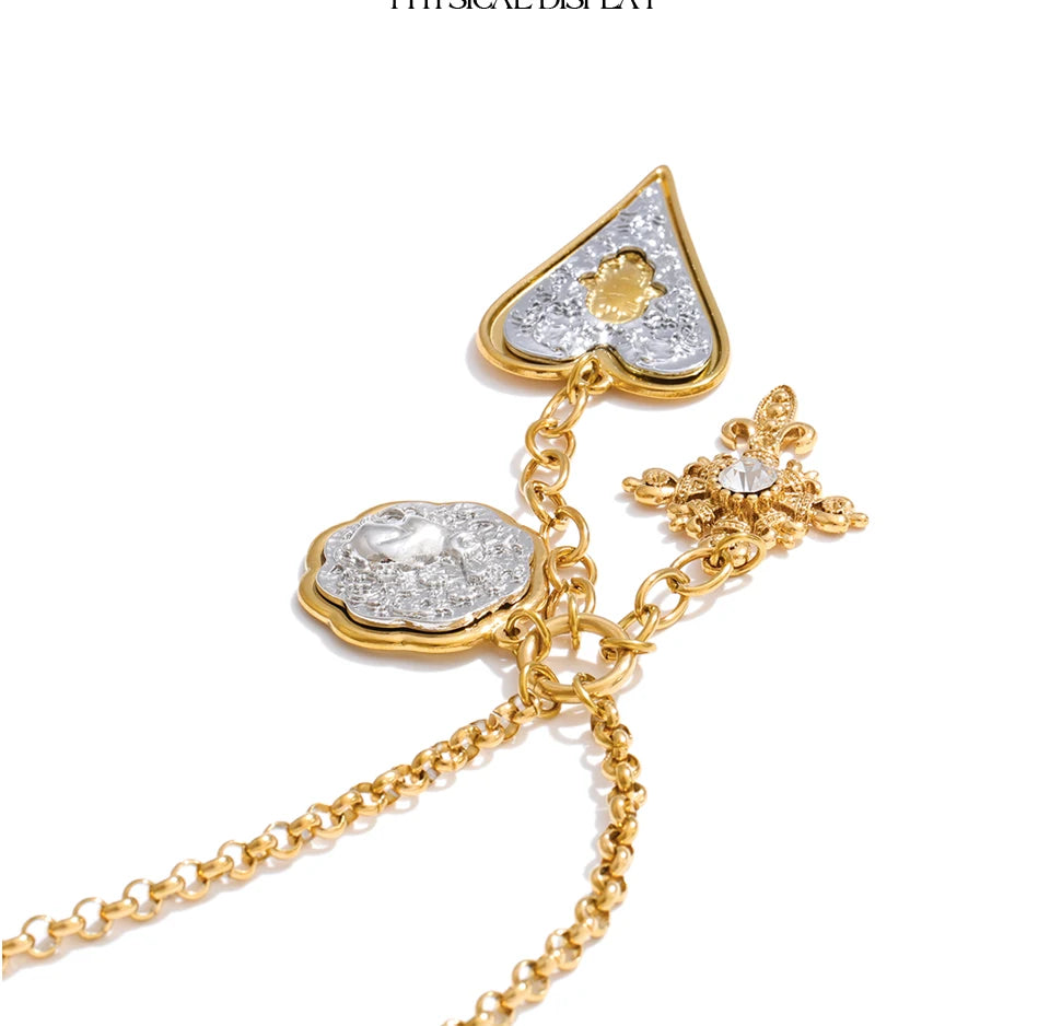 Heart cross necklace in gold-plated stainless steel.