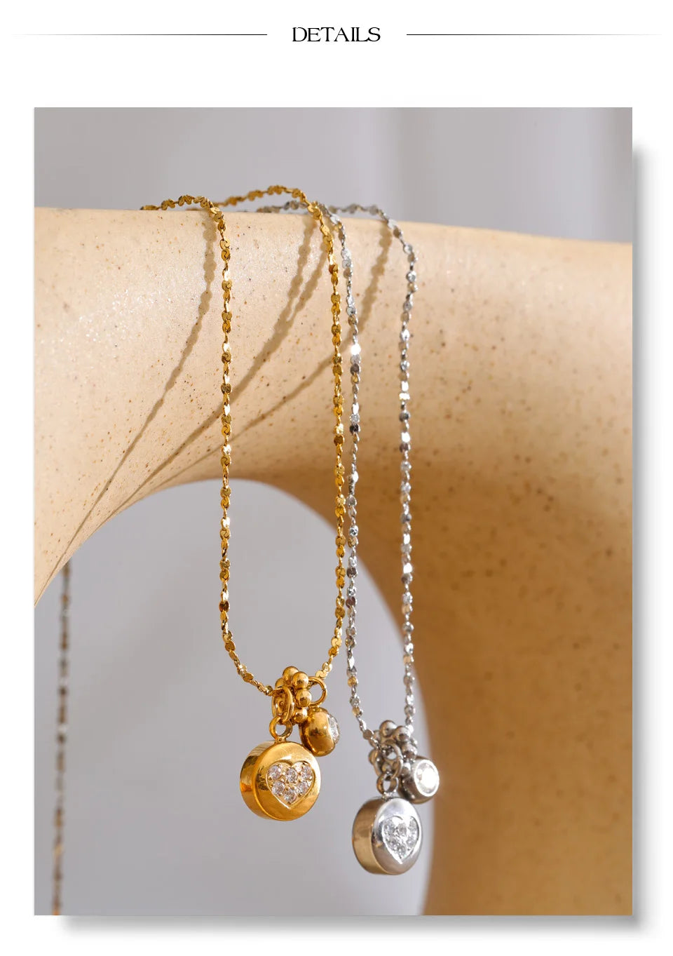Cubic zirconia heart geometric necklace in gold-plated stainless steel with cubic zirconia.