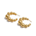 Beaded geometric earrings in gold-plated stainless steel.