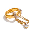 Cubic zirconia geometric chain ring in 18K gold-plated stainless steel with cubic zirconia.