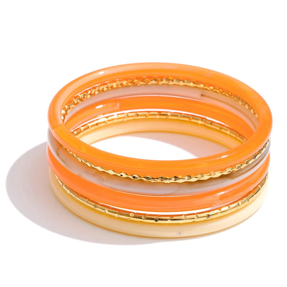 Resin multi-color geometric bracelet in gold-plated stainless steel with resin.