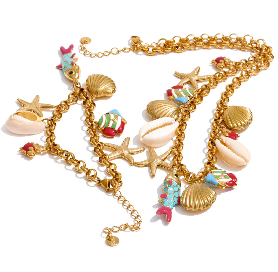 Shell enamel star necklace in gold-plated stainless steel with shell and enamel.