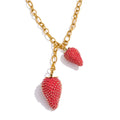 Red heart geometric necklace in gold-plated stainless steel.