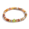Natural stone beaded geometric necklace in gold-plated stainless steel with natural stone.
