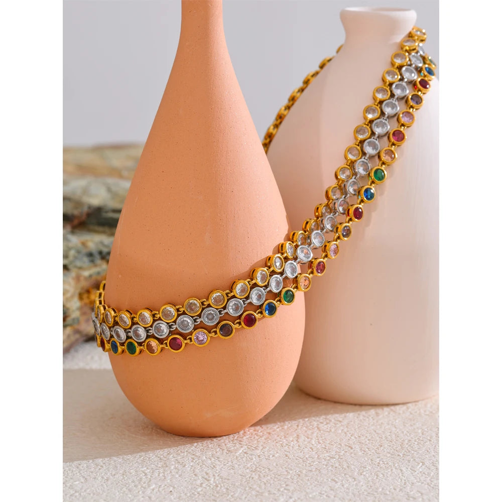 Cubic zirconia multi-color geometric necklace in gold-plated stainless steel with cubic zirconia.