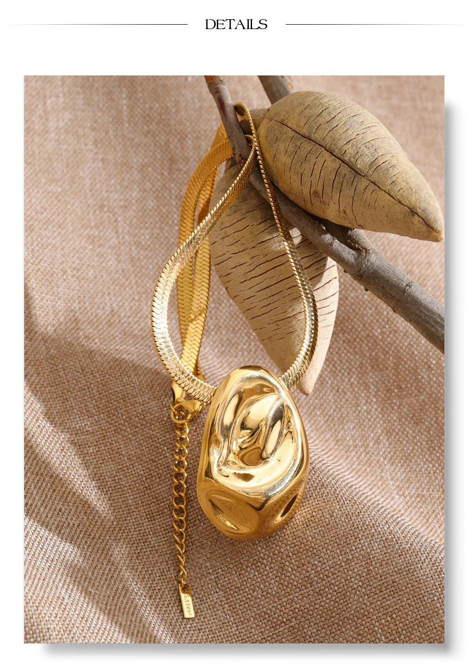 Hammered geometric necklace in gold-plated stainless steel.