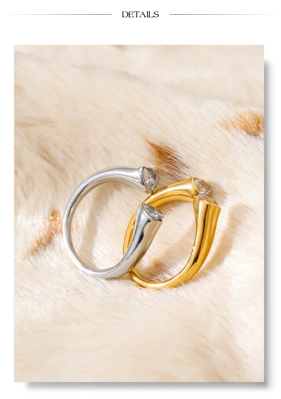 Cubic zirconia heart ring in 18K gold-plated stainless steel with cubic zirconia.