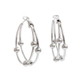 Geometric earrings in gold-plated stainless steel.