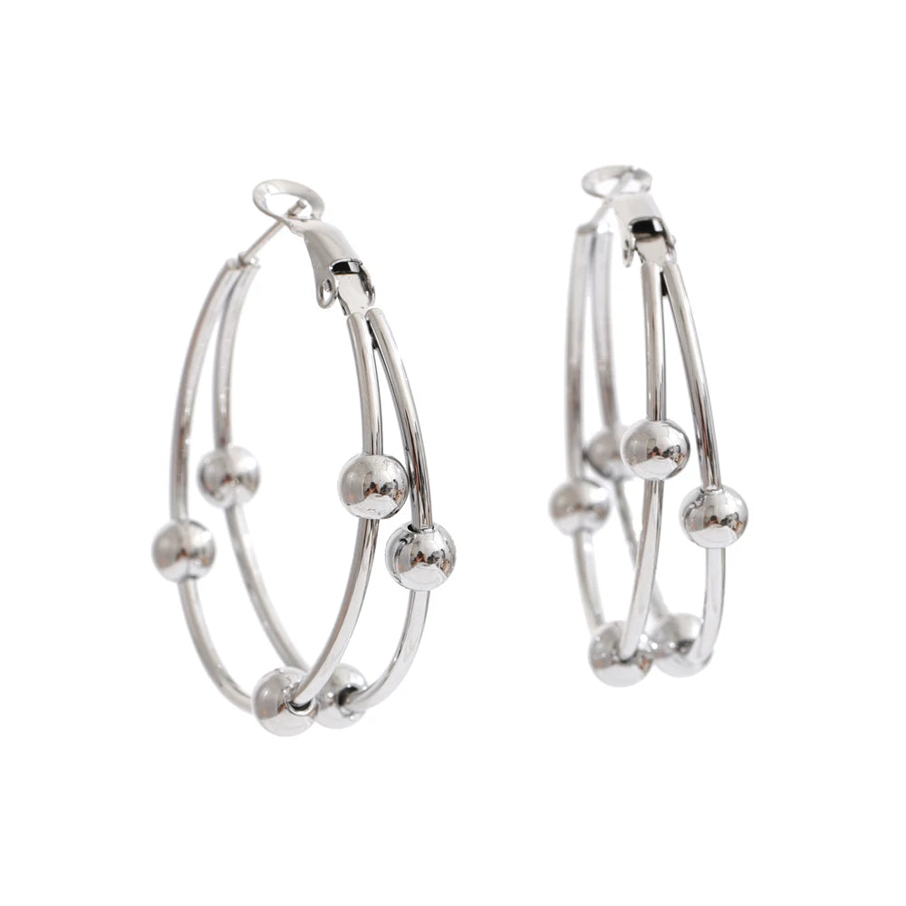 Geometric earrings in gold-plated stainless steel.