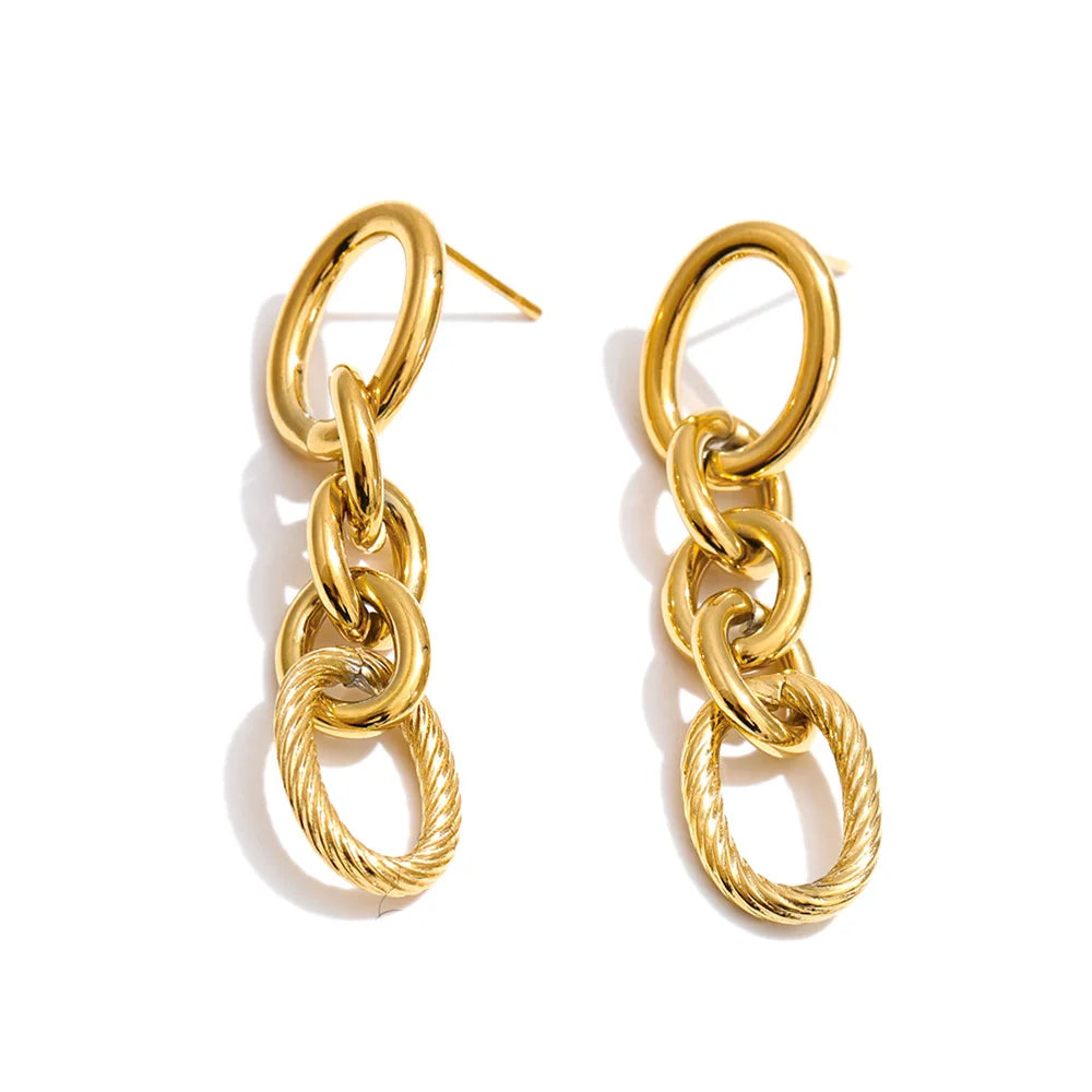 Geometric layered earrings in gold-plated stainless steel.