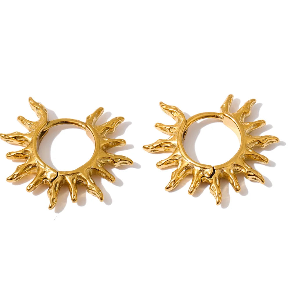 Star sun hammered earrings in gold-plated stainless steel.