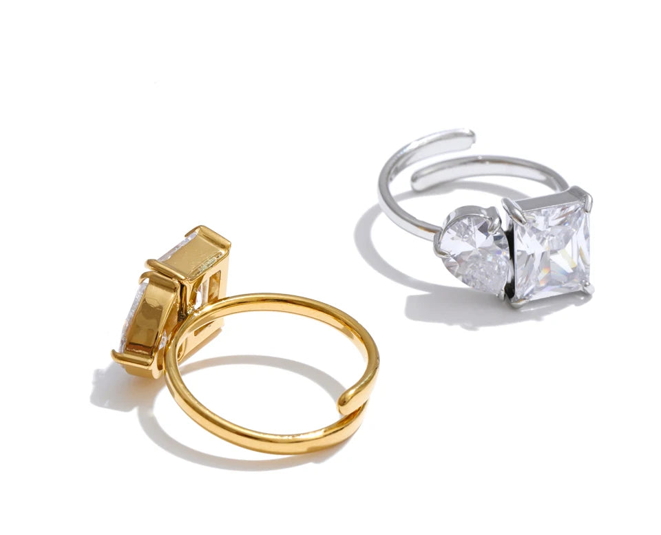 Cubic zirconia geometric ring in 18K gold-plated stainless steel with cubic zirconia.