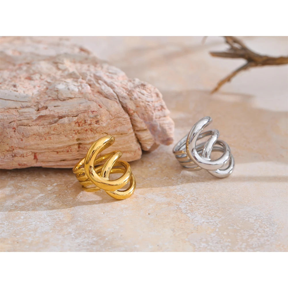 Geometric ring in gold-plated stainless steel.