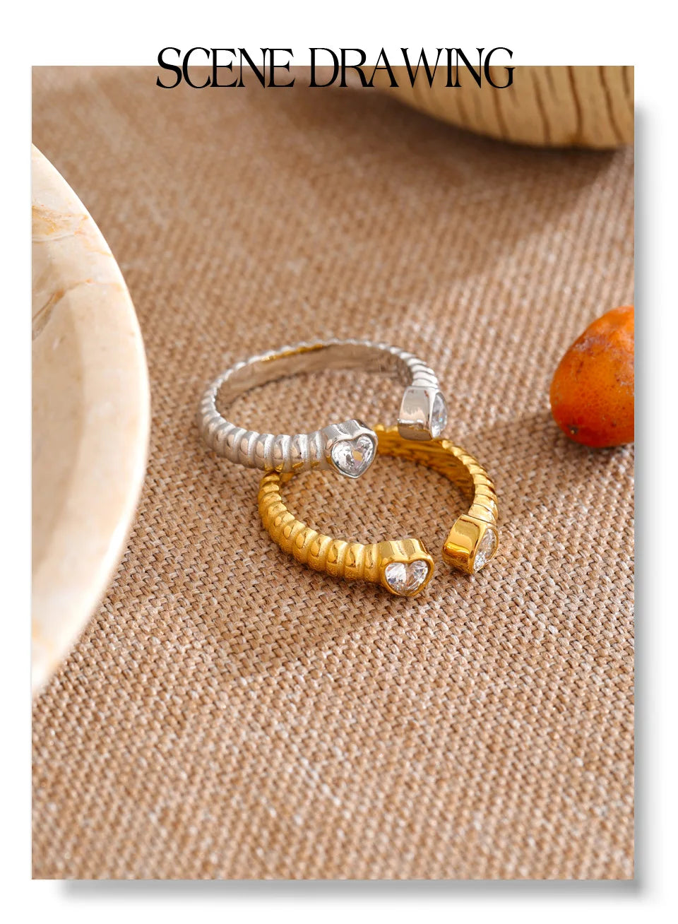 Cubic zirconia heart ring in gold-plated stainless steel with cubic zirconia.