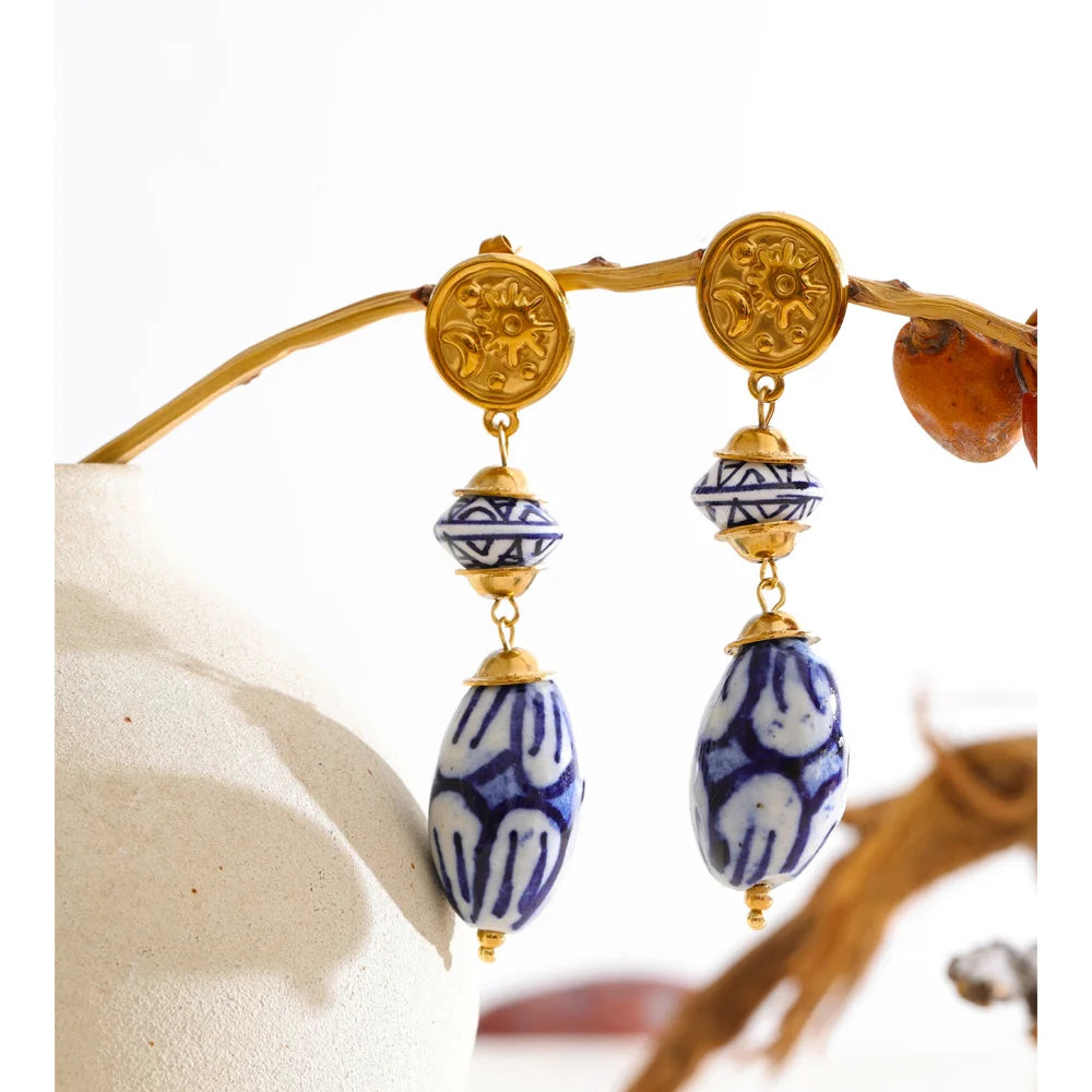 Blue geometric earrings in gold-plated stainless steel.