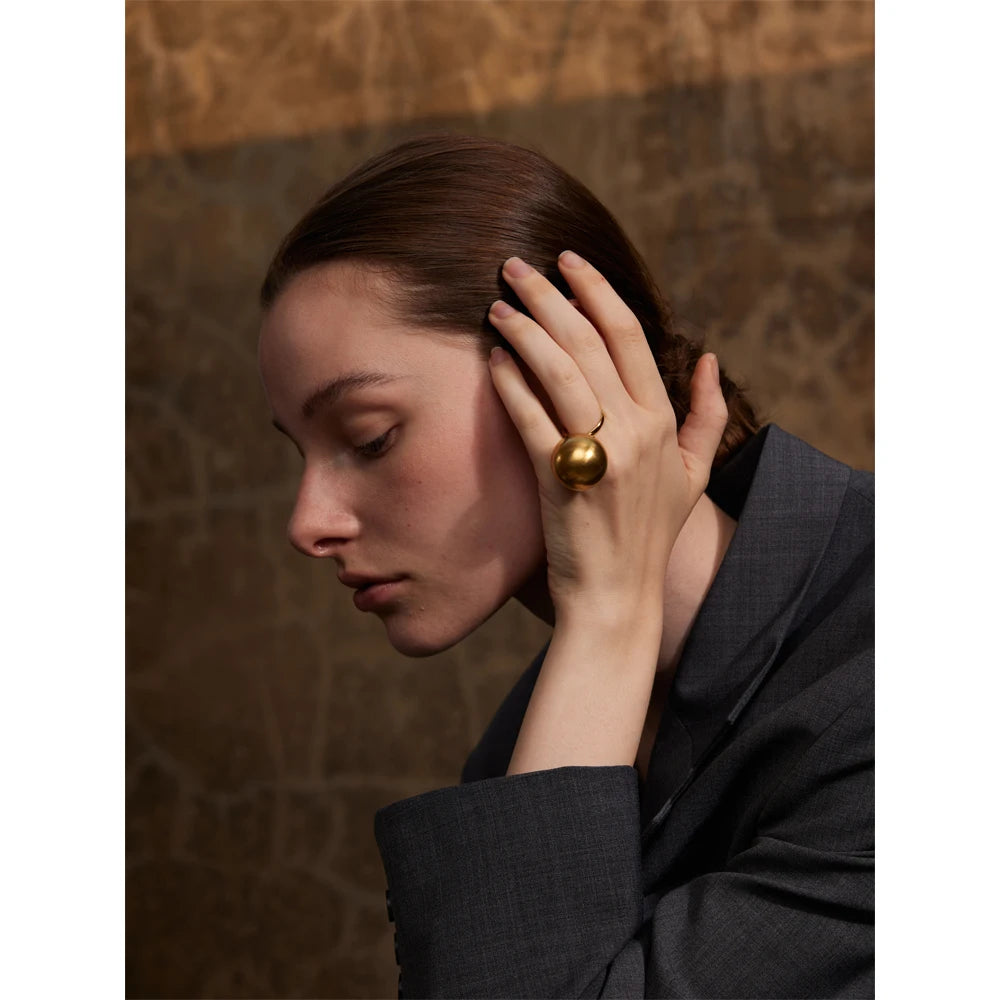 Geometric ring in 18K gold-plated stainless steel.