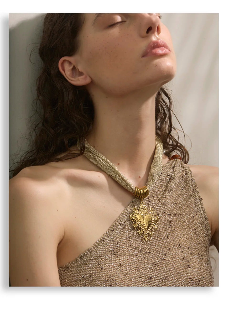 Heart chain necklace in gold-plated stainless steel.