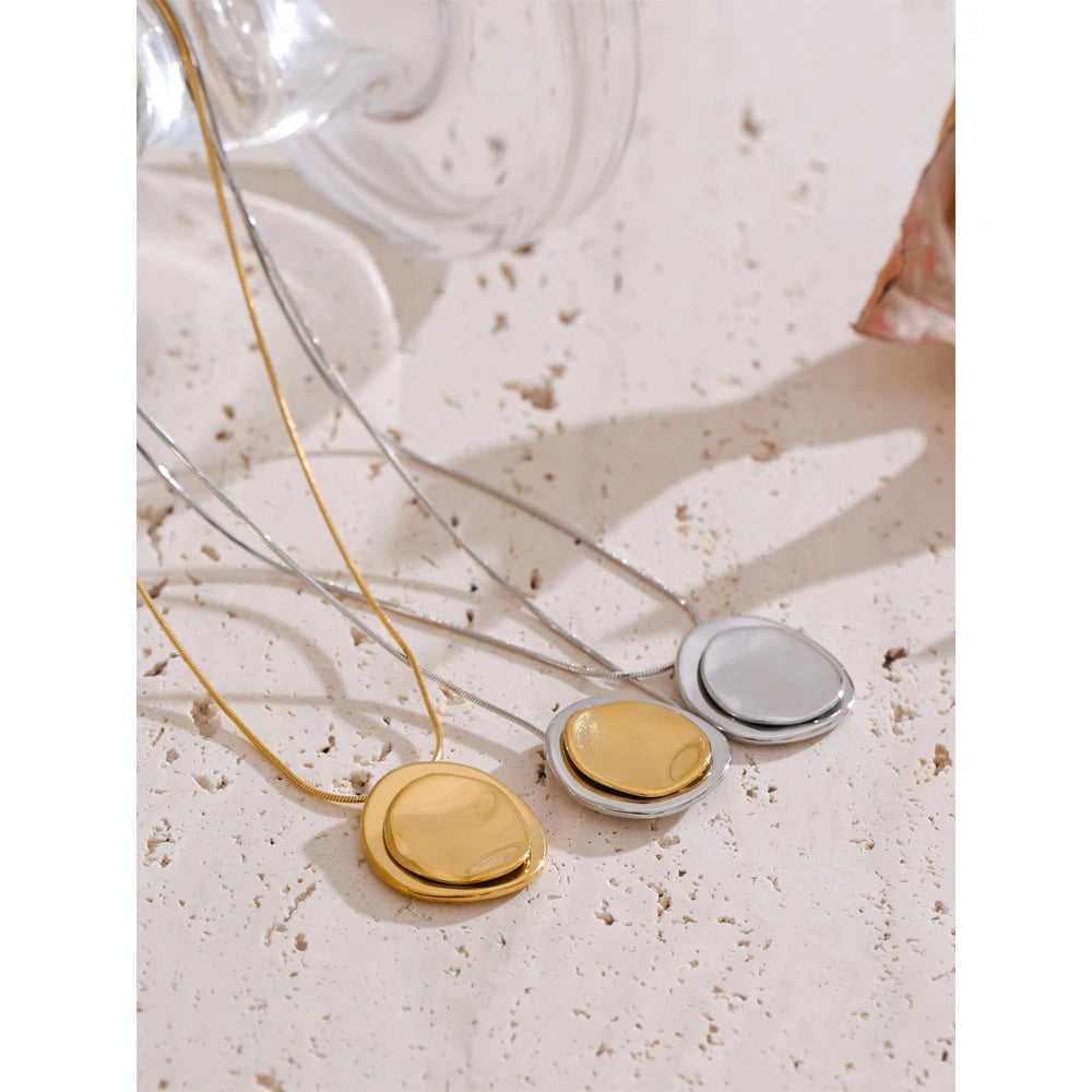 Coin geometric necklace in gold-plated stainless steel.