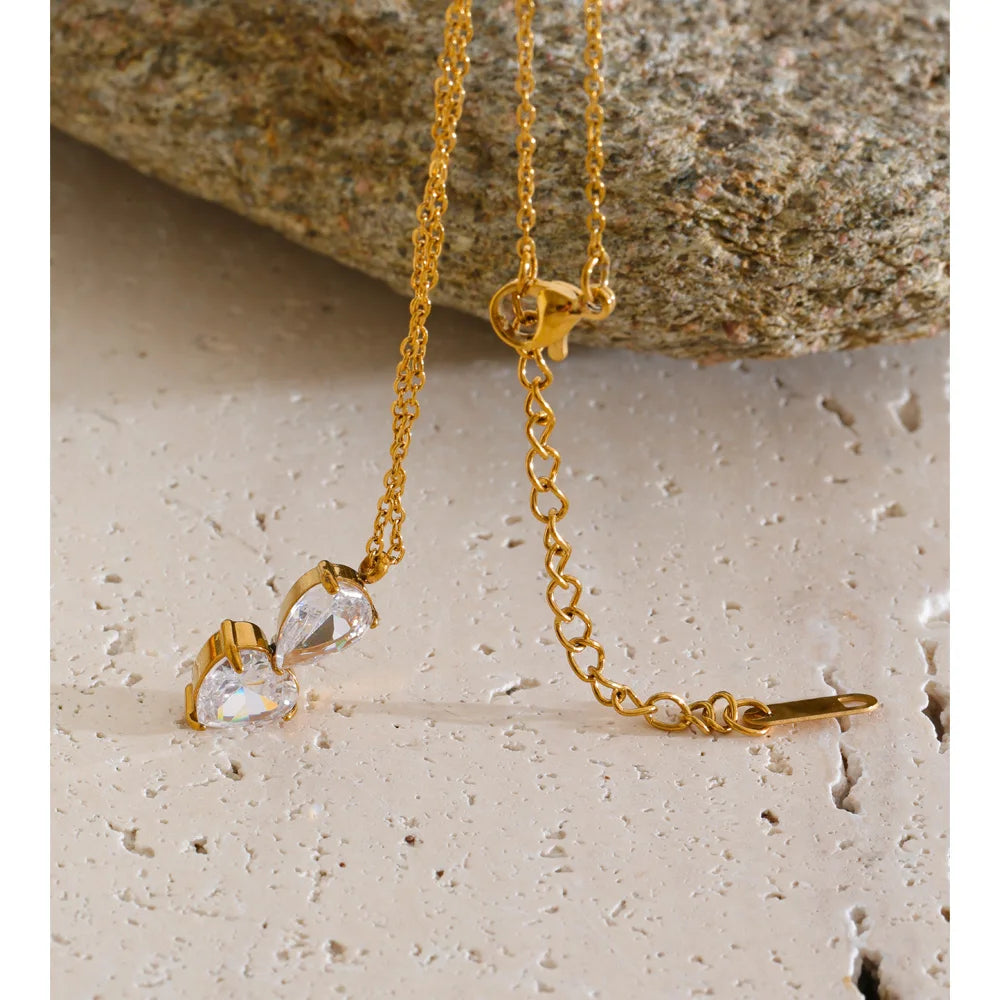 Cubic zirconia geometric necklace in gold-plated stainless steel with cubic zirconia.