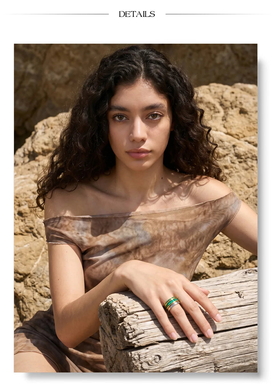 Cubic zirconia geometric layered ring in 18K gold-plated stainless steel with cubic zirconia.