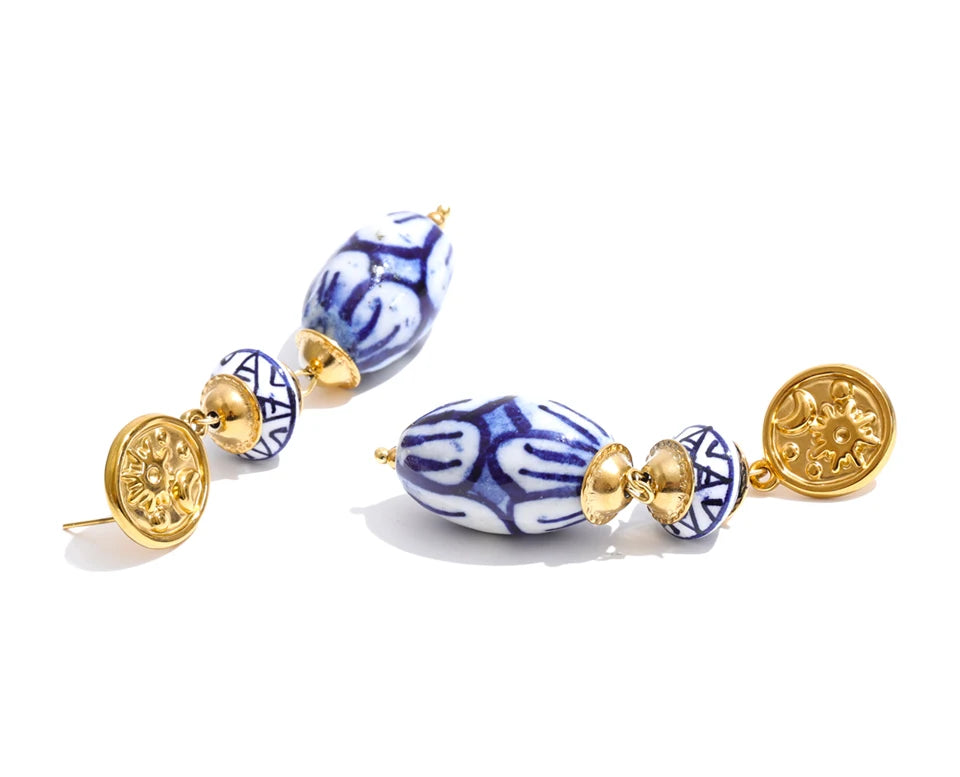 Blue geometric earrings in gold-plated stainless steel.