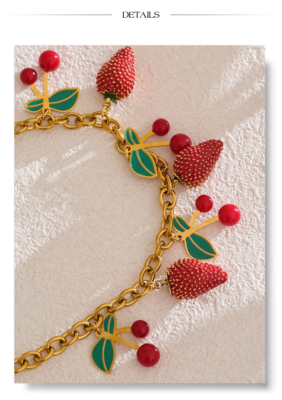 Red acrylic enamel necklace in gold-plated stainless steel with acrylic and enamel.