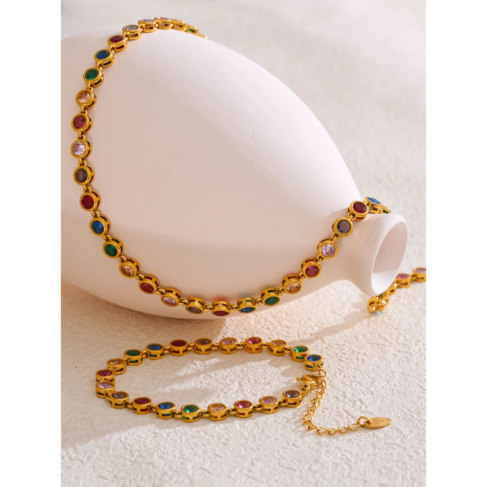 Cubic zirconia multi-color geometric necklace in gold-plated stainless steel with cubic zirconia.