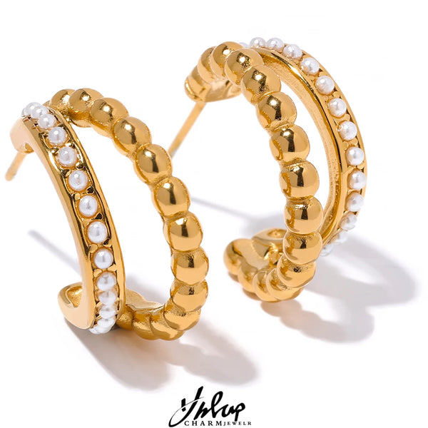Gold-plated stainless steel earrings with pearls.