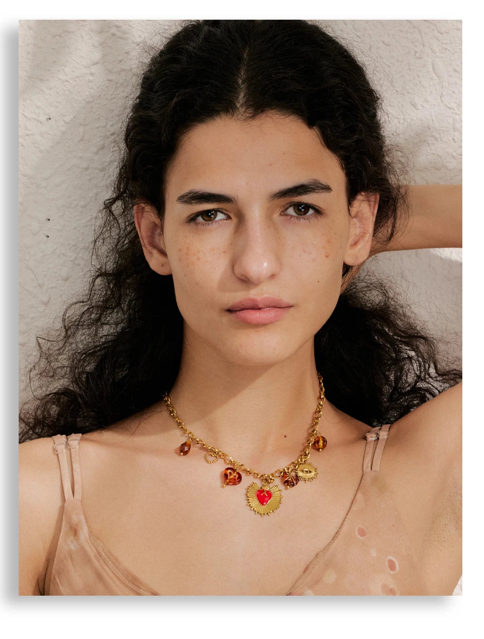 Sun geometric necklace in gold-plated stainless steel.