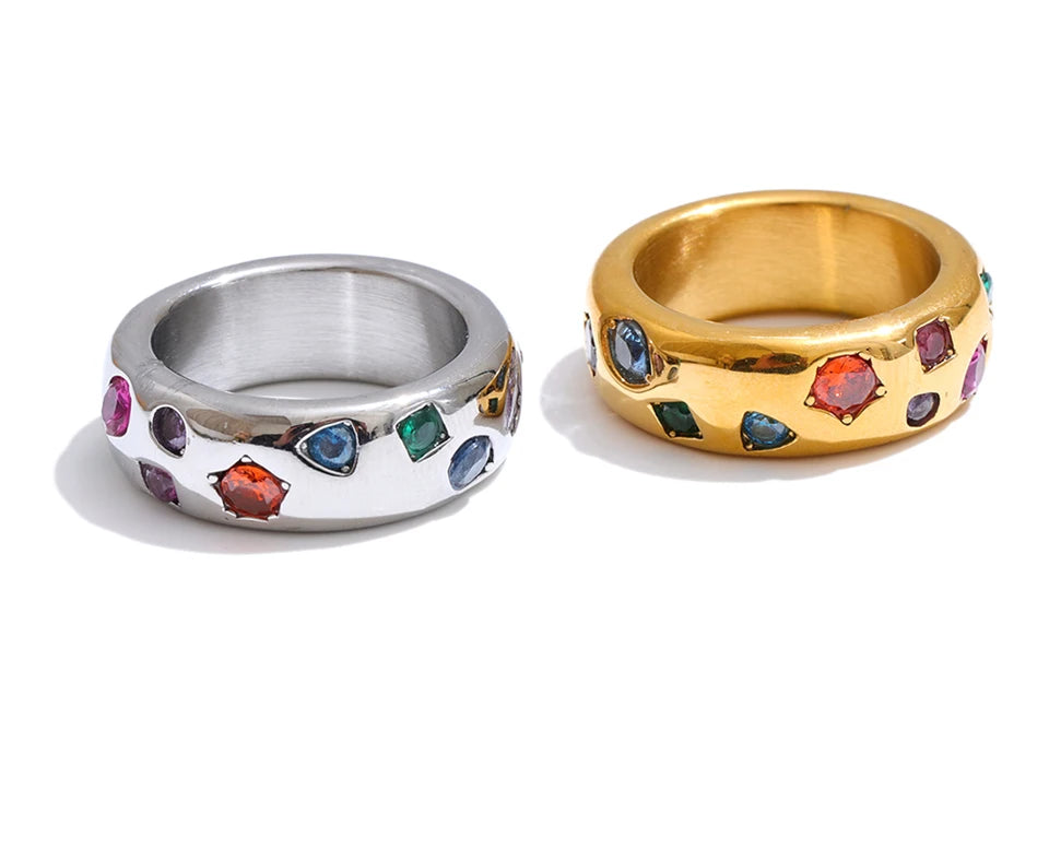 Cubic zirconia multi-color geometric ring in 18K gold-plated stainless steel with cubic zirconia.
