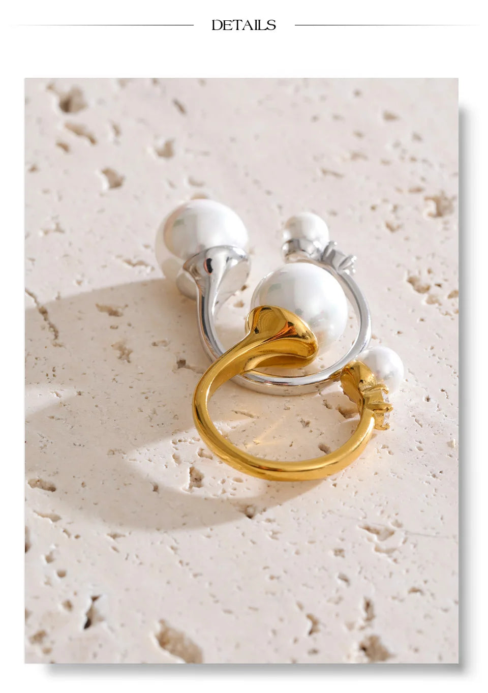 Cubic zirconia pearl geometric ring in 18K gold-plated stainless steel with pearl and cubic zirconia.